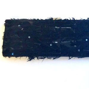 Noly Fuentes black satin clutch with feather trim